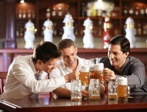 Anheuser Busch Beers 1 Guys enjoying a beer