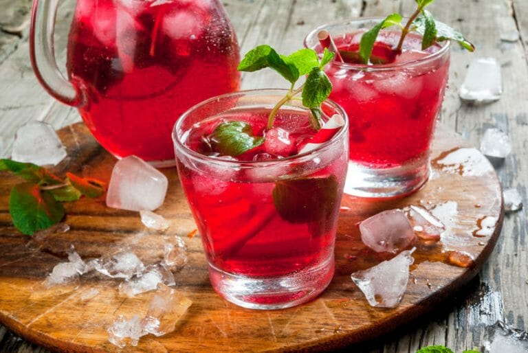 Hibiscus Summer Punch 57 Hibiscus summer punch in glasses and in a pitcher
