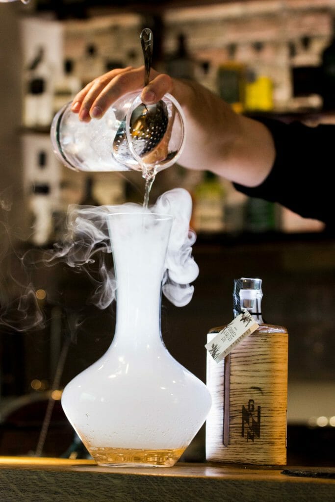 Bartending School in Riverside, CA 1 bartender pouring drink